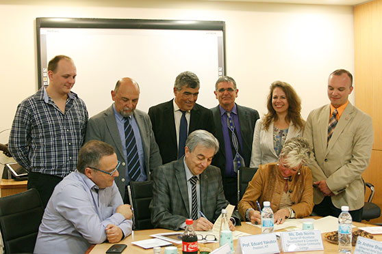 From right: Dr. Andrew Shepherd, Hadas Bar-Or, Mr. Ratner, Prof. Arik Sade, Mr. Michael Armon, Mr. Dmitry Patashov. Sitting: Ms. Deb Norris , Prof. Yakubov